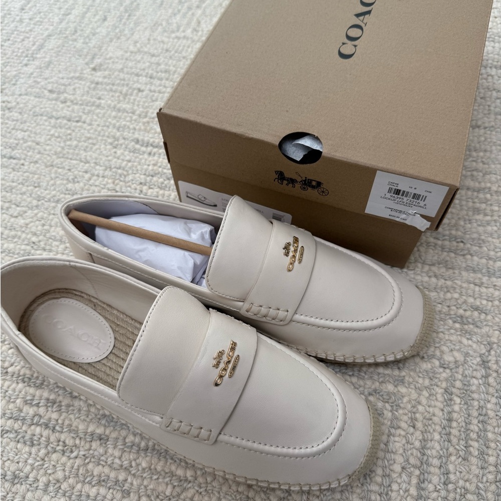 Coach women’s Cream Loafers